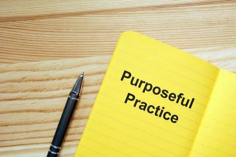 Writing note showing Purposeful Practice. The text is written on a paper of y Stock Illustration