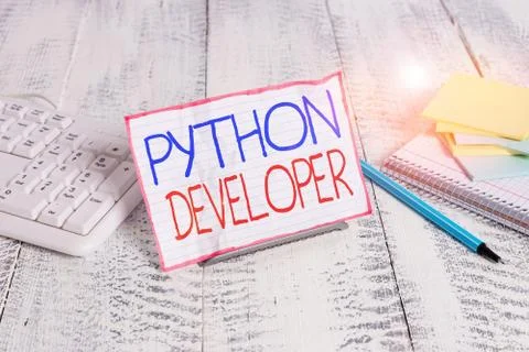 Writing note showing Python Developer. Business photo showcasing responsible for Stock Photos
