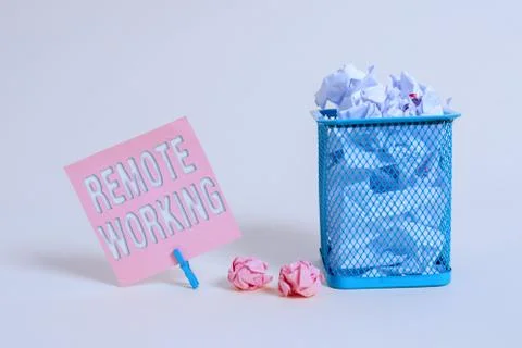 Writing note showing Remote Working. Business photo showcasing style that allows Stock Photos