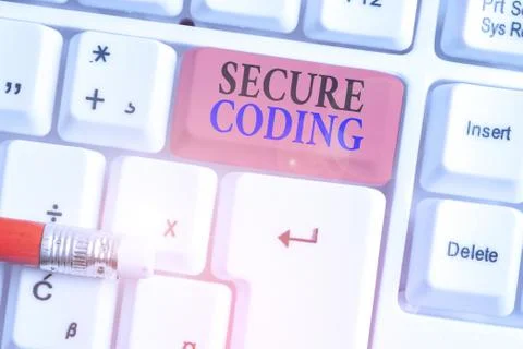 Writing note showing Secure Coding. Business photo showcasing Applied to avoid Stock Photos