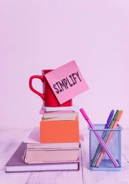 Writing note showing Simplify. Business photo showcasing make something simpler Stock Photos
