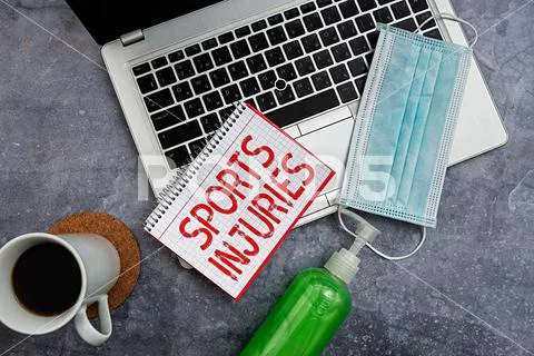 Writing note showing Sports Injuries. Business photo showcasing injuries that Stock Photos