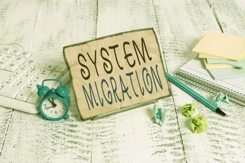 Writing note showing System Migration. Business photo showcasing moving from the Photos