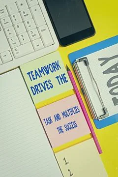 Writing note showing Teamwork Drives The Task And Multiplies The Success Stock Photos