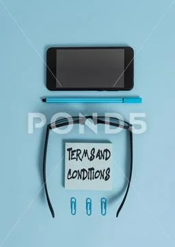 Writing note showing Terms And Conditions. Business photo showcasing rules that Stock Photos