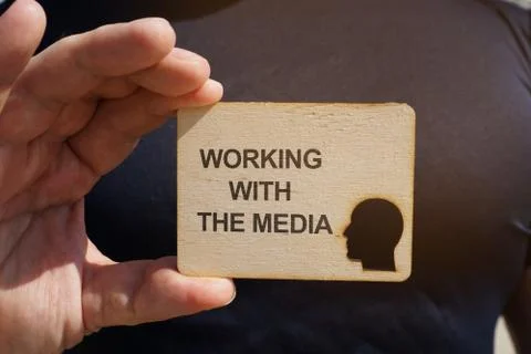 Writing note showing the text Working With the Media Stock Photos