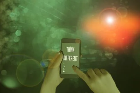 Writing note showing Think Different. Business photo showcasing unusual method Stock Photos