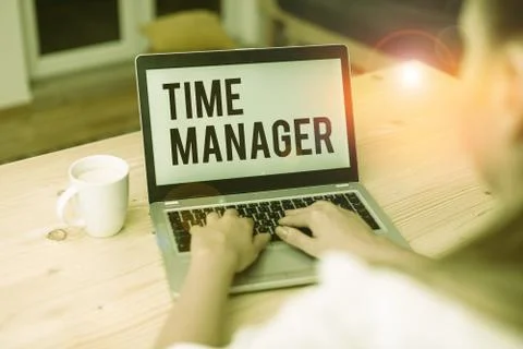 Writing note showing Time Manager. Business photo showcasing process of planning Stock Photos