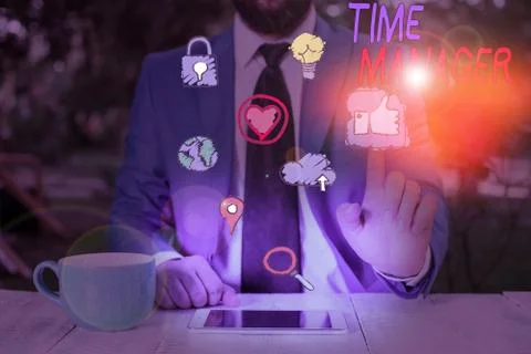 Writing note showing Time Manager. Business photo showcasing process of planning Stock Photos