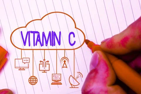 Writing note showing Vitamin C. Business photo showcasing it promotes healing Foto stock