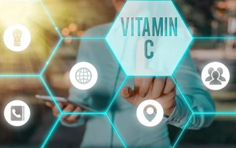 Writing note showing Vitamin C. Business photo showcasing it promotes healing Stock Photos