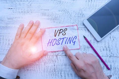 Writing note showing Vps Hosting. Business photo showcasing mimics a dedicated 库存照片