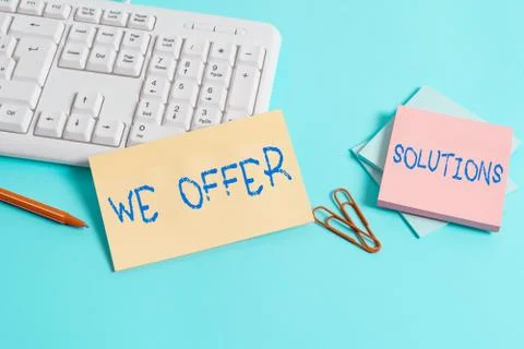 Writing note showing We Offer Solutions. Business photo showcasing way to solve Foto stock