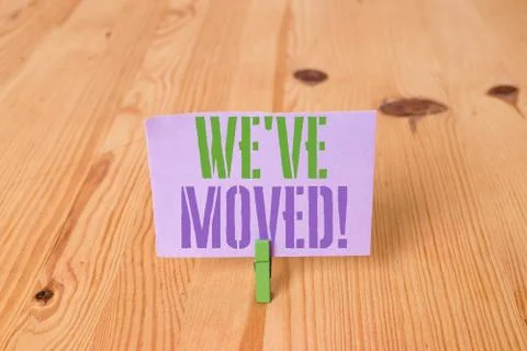 Writing note showing We Ve Moved. Business photo showcasing having strong Stock Photos