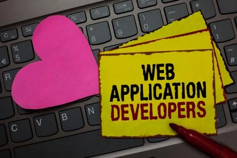 Writing note showing Web Application Developers. Business photo showcasing Stock Photos