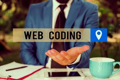 Writing note showing Web Coding. Business photo showcasing work involved in 写真素材