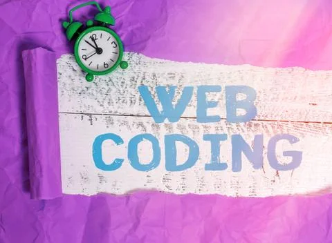 Writing note showing Web Coding. Business photo showcasing a system of symbols Photos