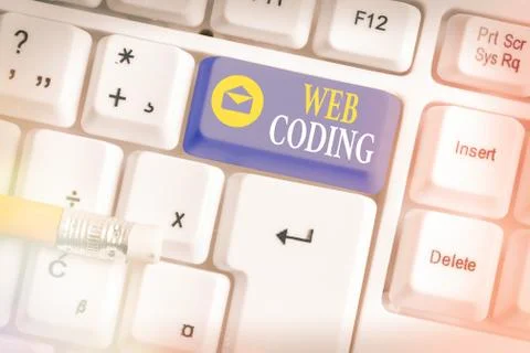 Writing note showing Web Coding. Business photo showcasing a system of symbols Photos