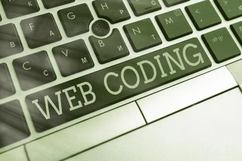 Writing note showing Web Coding. Business photo showcasing a system of symbols Stock-Fotos