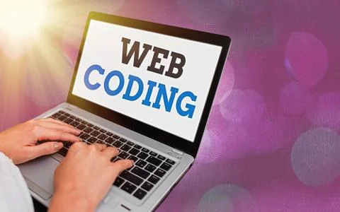 Writing note showing Web Coding. Business photo showcasing a system of symbols Stock-Fotos