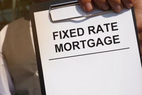 Writing note shows the printed text Fixed rate mortgage Stock Photos