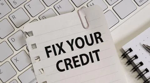 Writing note shows the text Fix your credit, business credit. Stock Photos
