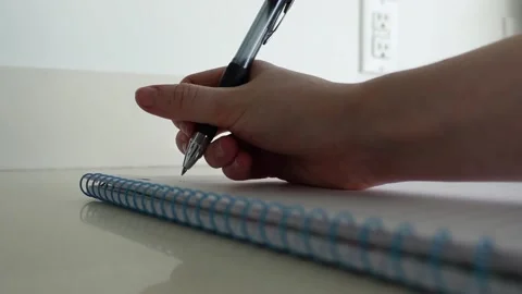 Writing In a Notebook 02 Stock Footage 147833800