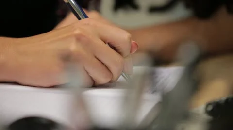 Writing in a notebook 스톡 동영상 22155261