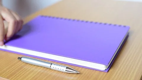 Writing on notebook Stock Footage 71365929