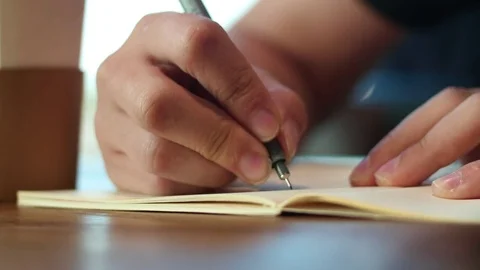 Writing on a notebook Stock Footage 83715880