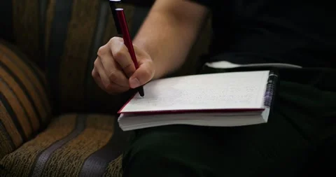 Writing in a Notebook Stock Footage 268606813