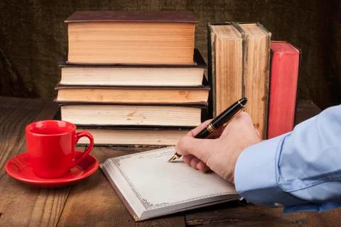 Writing in Notebook Stock Photos