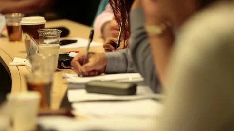 Writing in notebooks 스톡 동영상 77053514