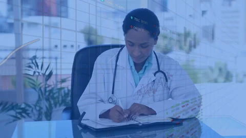 Writing notes with financial data and graphs, doctor in office setting Stock Footage 304111458