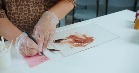 Writing notes next to mixed cosmetic pigment Stock Footage 314601347