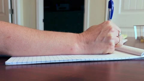 Writing Notes In An Office Without Sound Stock Footage 198199856