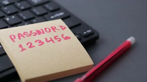 Writing password on a sticky note Stock Footage 171716008
