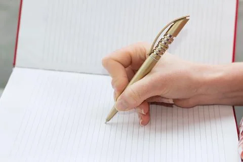 Writing with a pen Stock Photos