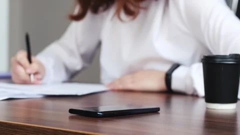 Writing, phone and papers with hands of young woman in home office for research Video stock 269045853