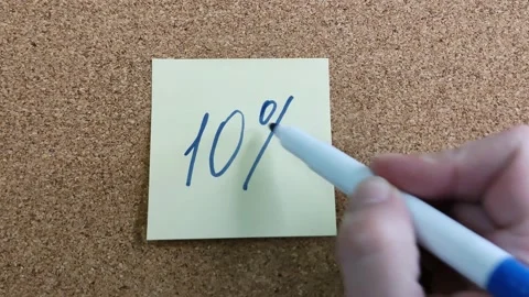Writing a phrase with a 10% felt-tip pen on a yellow paper sticker Stock Footage 170087576