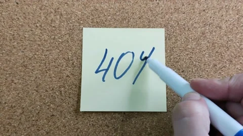 Writing a phrase 40% with a felt-tip pen on a yellow paper sticker Stockbeeldmateriaal 172012428