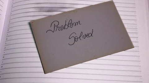 Writing problem solved on white label. Text on label, copy space. Stock Photos