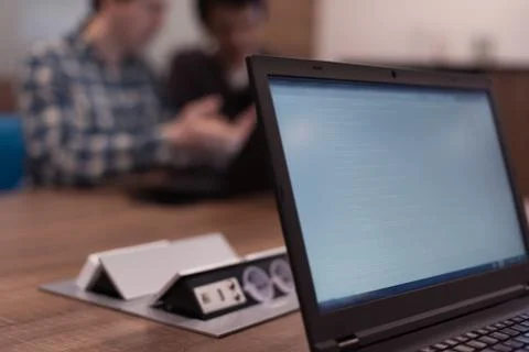 Writing programming code on laptop Stockfoto's