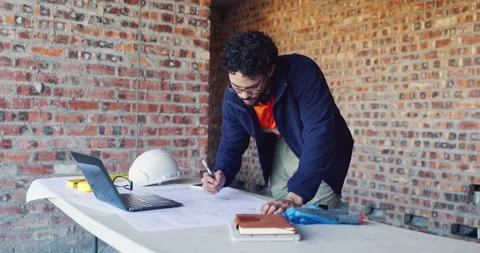 Writing, reading and man with blueprint at construction site, planning update or Stock Footage 336791460