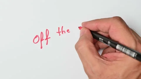 Writing with a red marker the sentence: Off the chain Stock Footage 221782697