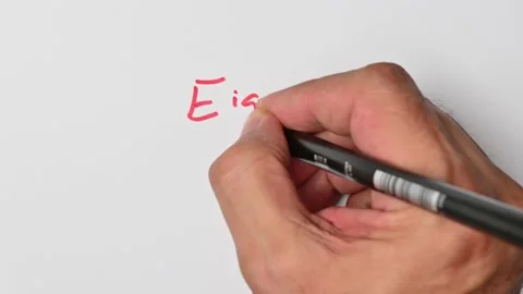 Writing with a red marker the sentence: Eight Stock Footage 221784019