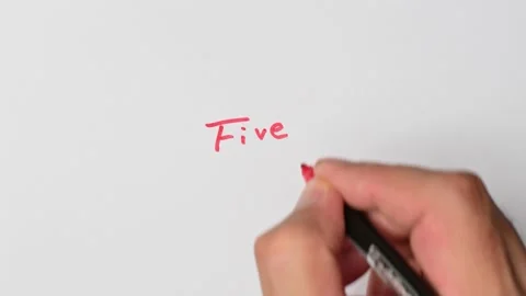 Writing with a red marker the sentence: Five Stock Footage 221783982