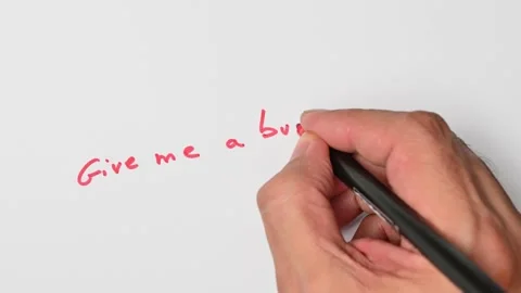 Writing with a red marker the sentence: Give me a buzz! Stock Footage 221782427