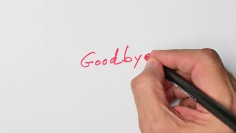 Writing with a red marker the sentence: Goodbye Stock Footage 221780780