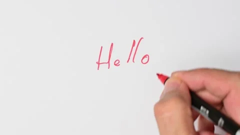 Writing with a red marker the sentence: Hello Stock Footage 221780749